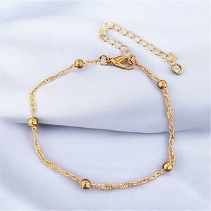 Women’s gold alloy beaded 6.5 inch bracelet with 2 inch extender